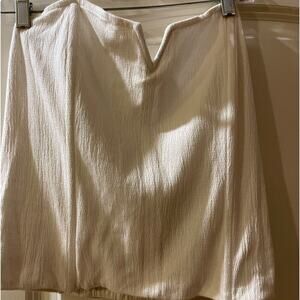 Bustier- white fabric with 2 bones in front. Sides & back 12 “ white fabric -